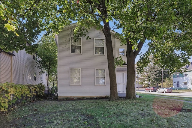 view of property exterior featuring a yard