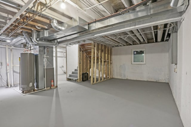 basement with heating unit and water heater