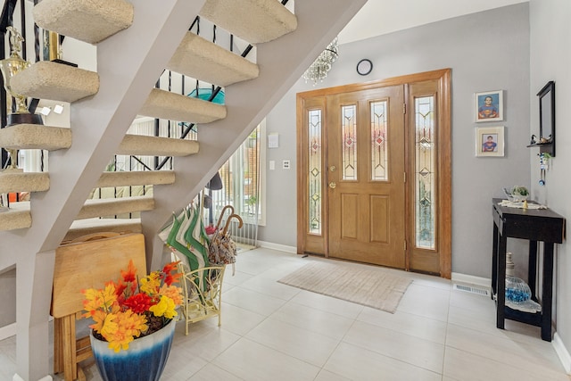 entrance foyer featuring light tile patterned flooring