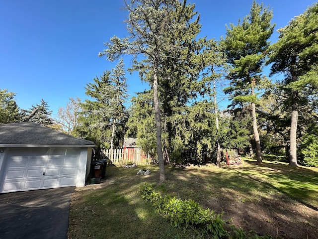 view of yard with a garage