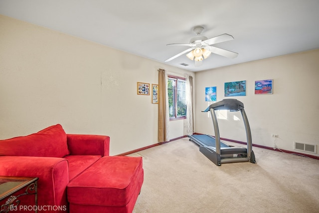 workout area featuring carpet floors and ceiling fan