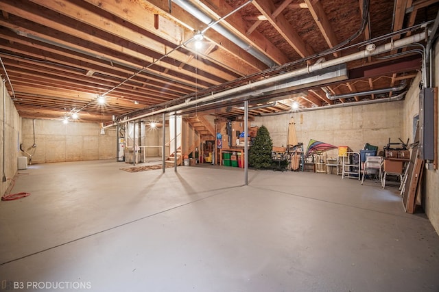 basement with strapped water heater