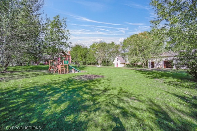 view of yard with a playground