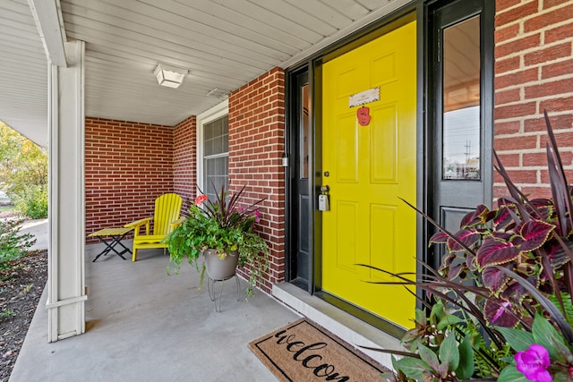 entrance to property with covered porch