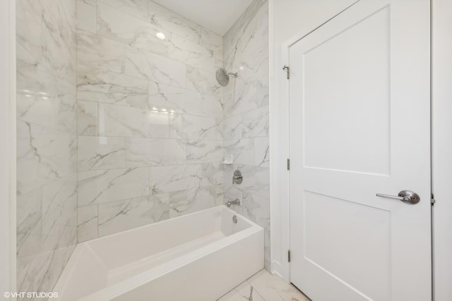 bathroom with shower / washtub combination and marble finish floor