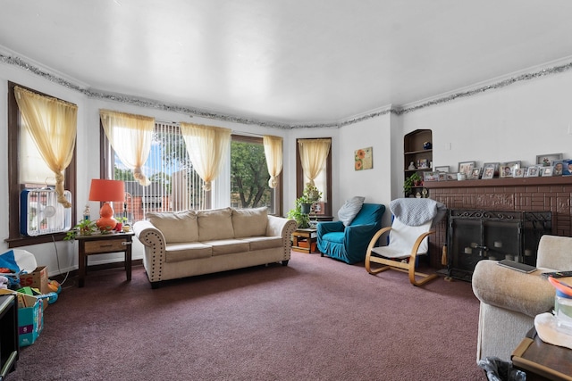 living room with carpet and a brick fireplace