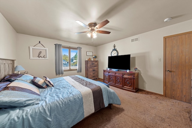 bedroom with ceiling fan and carpet