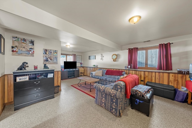 living room with wood walls