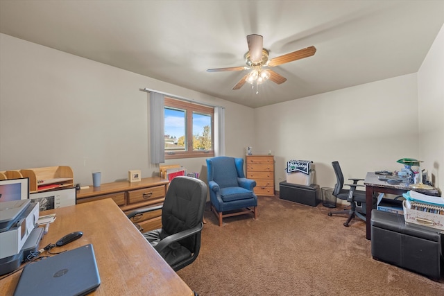 office with carpet floors and ceiling fan