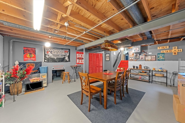 dining room featuring concrete flooring