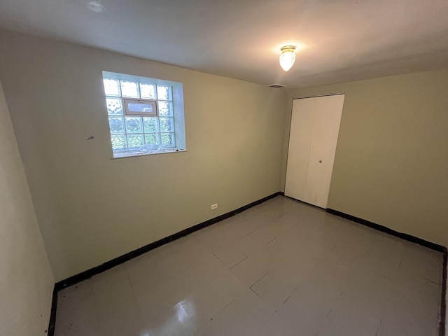 6916 S Lowe Ave, Chicago, IL 60621 - spare room with baseboards