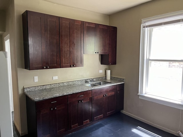 6916 S Lowe Ave, Chicago, IL 60621 - kitchen with a sink and light stone countertops