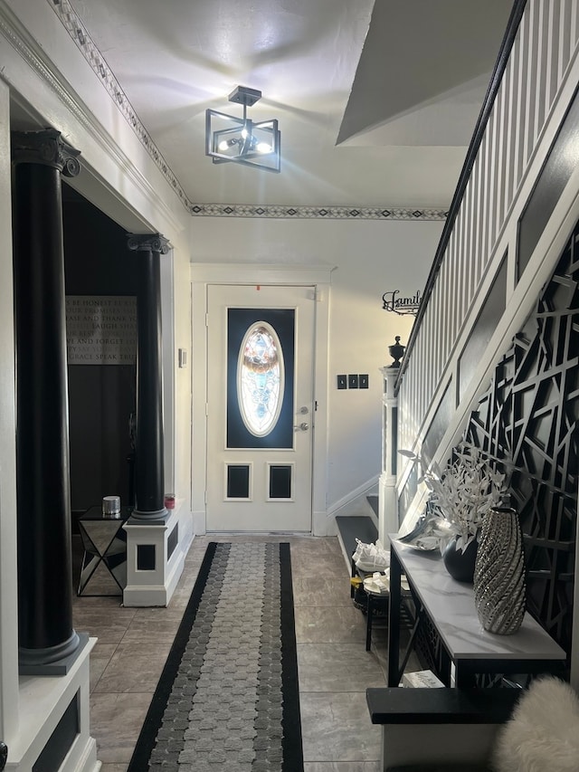 mudroom with ornate columns