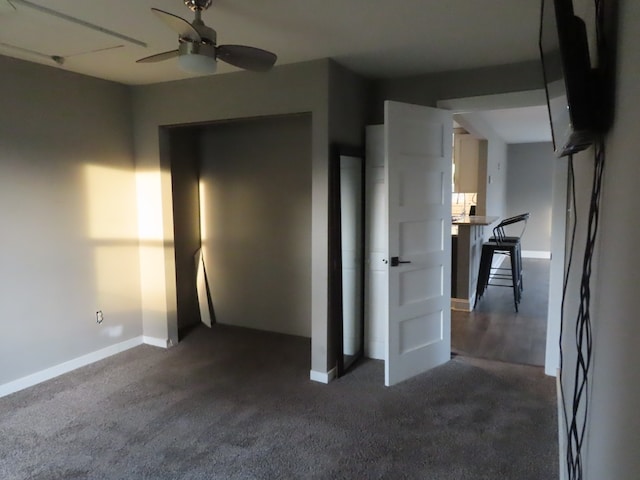 interior space featuring ceiling fan