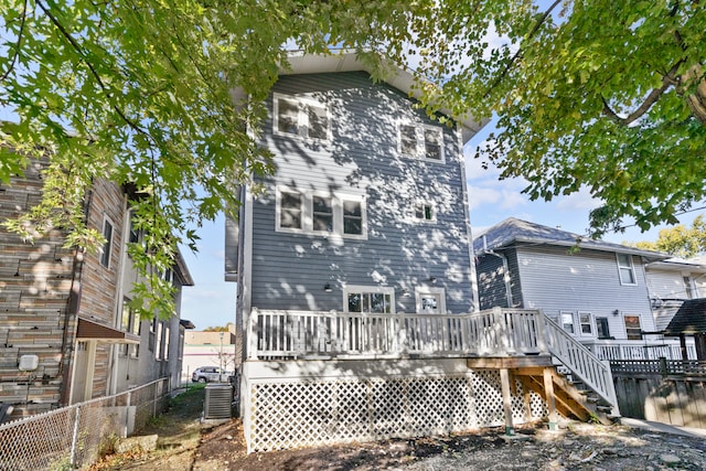 rear view of house with a deck