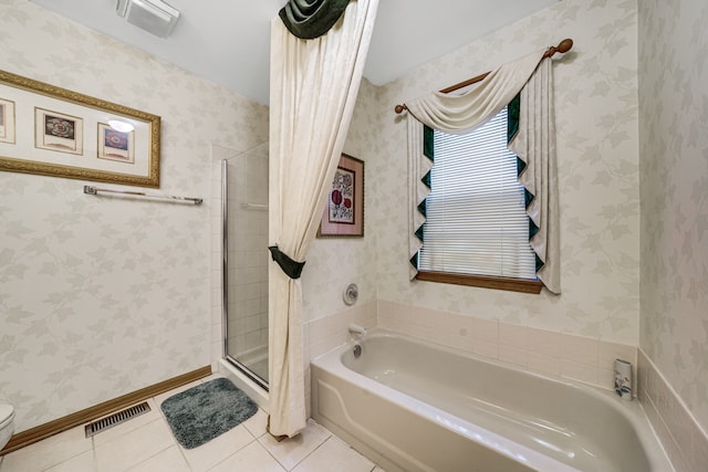 bathroom with separate shower and tub, toilet, and tile patterned floors