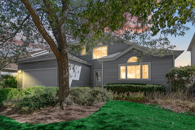 view of front property with a lawn