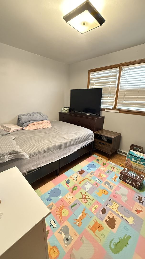 bedroom featuring light hardwood / wood-style flooring