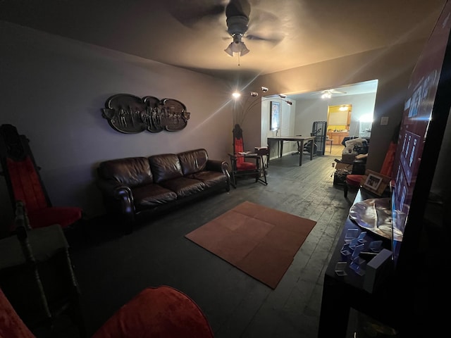 living room featuring ceiling fan and wood-type flooring