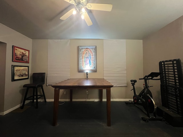 interior space with ceiling fan