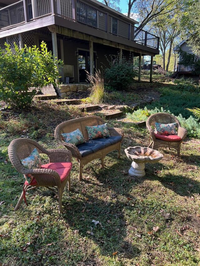 view of yard featuring a wooden deck