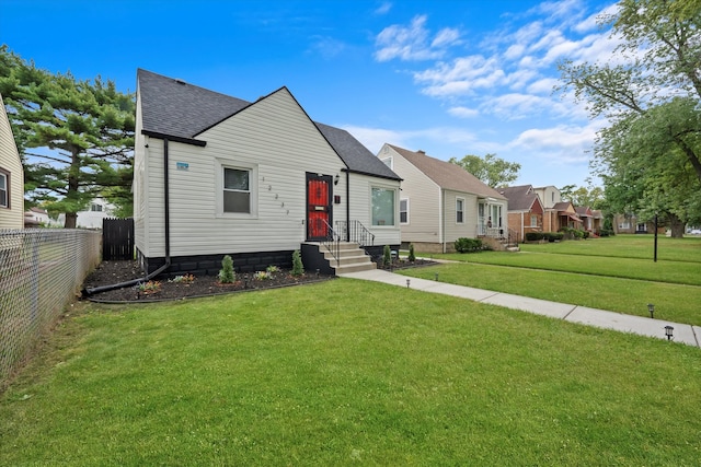 view of front of house with a front lawn