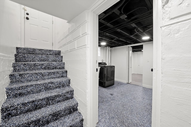 stairs with washing machine and dryer