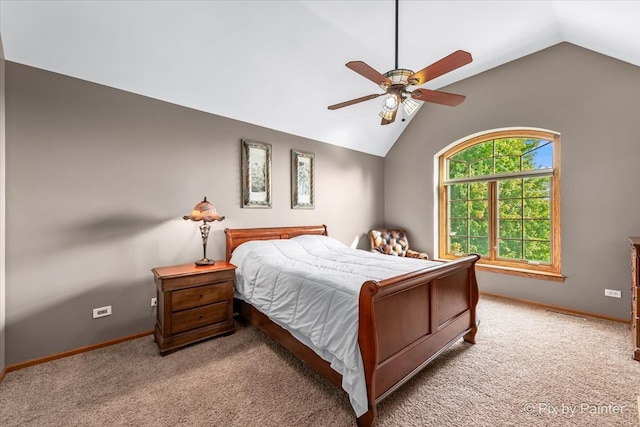 carpeted bedroom with ceiling fan and lofted ceiling