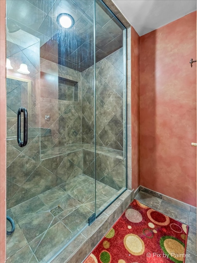 bathroom with an enclosed shower