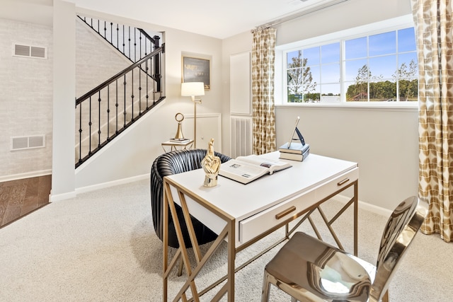 home office featuring light colored carpet