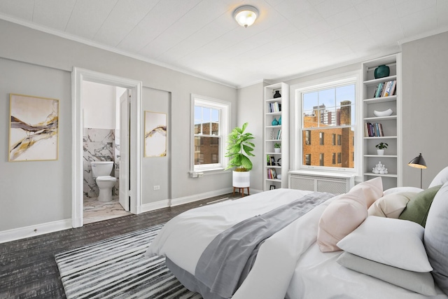 bedroom featuring ornamental molding, dark wood-type flooring, and connected bathroom