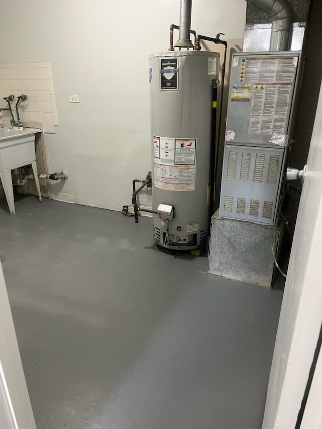 utility room with water heater