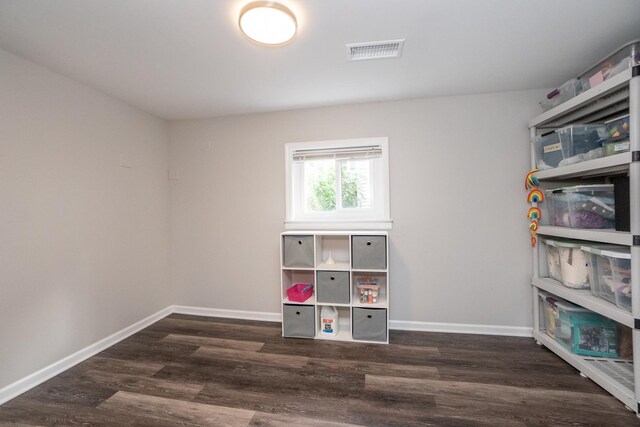 living room with dark hardwood / wood-style flooring