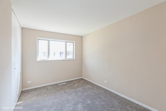 empty room with carpet floors