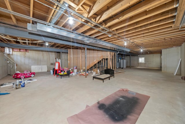 basement featuring gas water heater