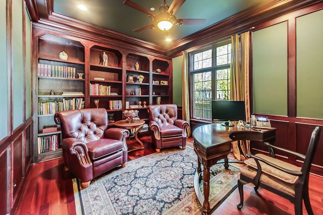 office area with ornamental molding, hardwood / wood-style flooring, and ceiling fan