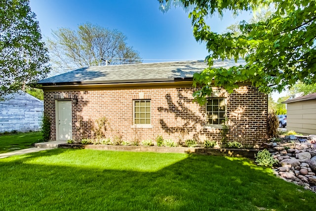 exterior space with a front yard