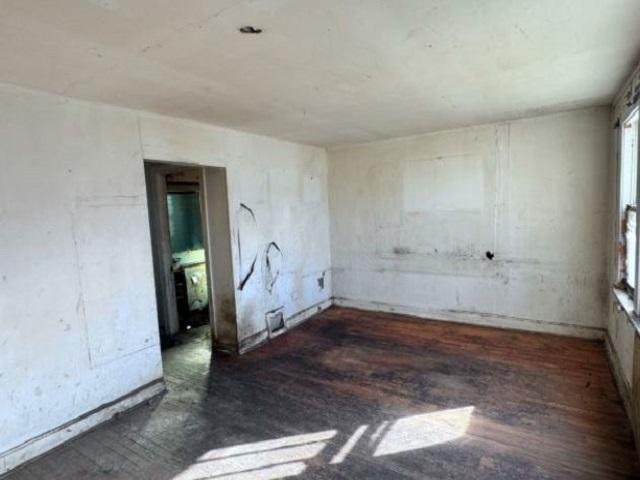 2654 W 98th Pl, Evergreen Park, IL 60805 - empty room featuring wood finished floors