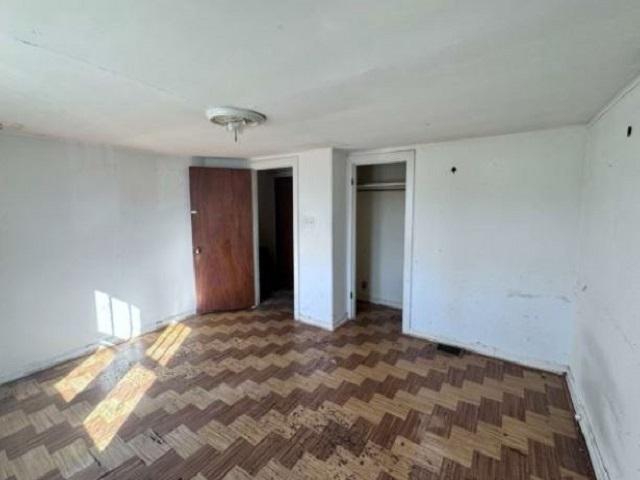 2654 W 98th Pl, Evergreen Park, IL 60805 - unfurnished bedroom with a closet