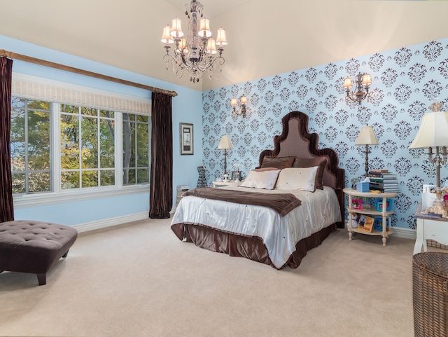 carpeted bedroom with an inviting chandelier and vaulted ceiling