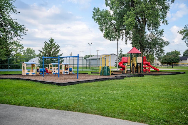 view of playground featuring a lawn