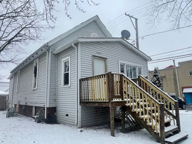 view of snow covered house