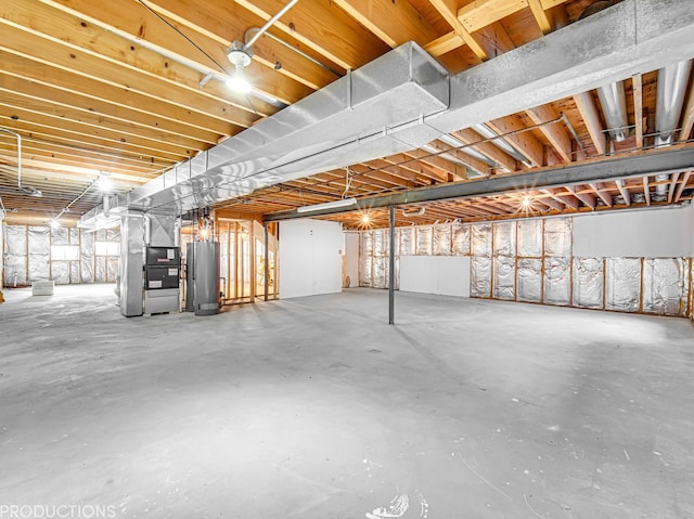 basement with heating unit and gas water heater