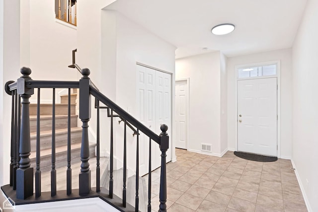 view of tiled foyer entrance