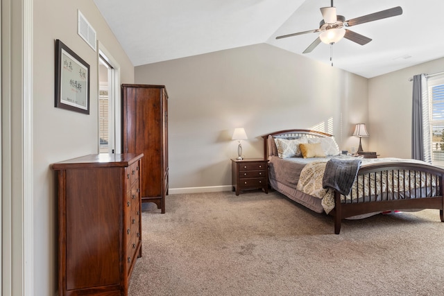 carpeted bedroom with lofted ceiling and ceiling fan