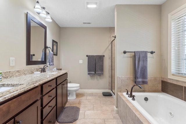 full bathroom featuring tile patterned floors, toilet, independent shower and bath, vanity, and a textured ceiling