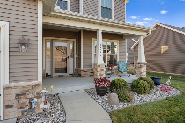 doorway to property with covered porch