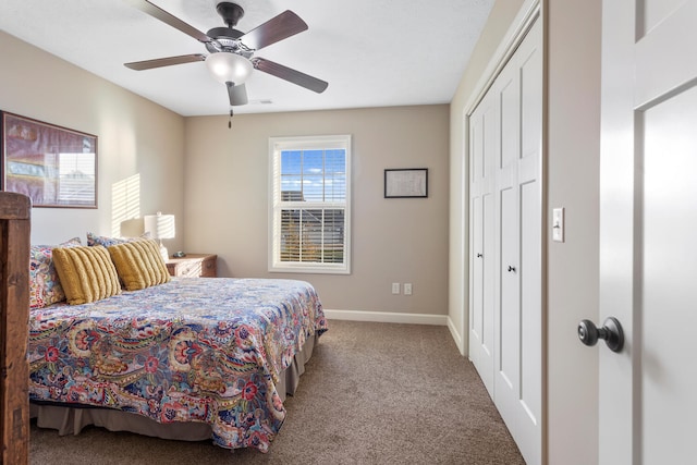 bedroom featuring a closet, ceiling fan, and light colored carpet