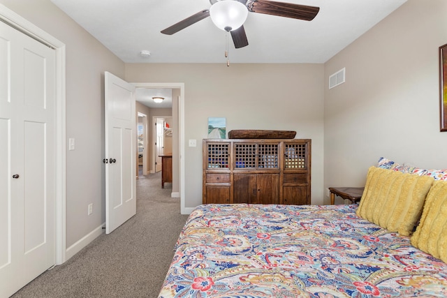 carpeted bedroom featuring ceiling fan