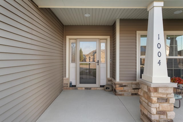 entrance to property with covered porch